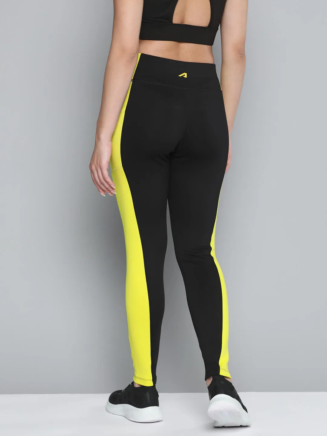 Alcis Women Black Yellow Colorblocked Sports Tights